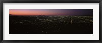 Framed High angle view of a city at night from Griffith Park Observatory, City Of Los Angeles, Los Angeles County, California, USA