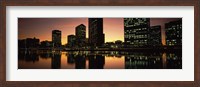 Framed Buildings lit up at dusk, Oakland, Alameda County, California, USA