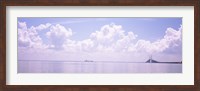 Framed Sea with a container ship and a suspension bridge in distant, Sunshine Skyway Bridge, Tampa Bay, Gulf of Mexico, Florida, USA
