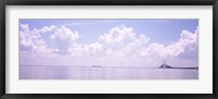 Framed Sea with a container ship and a suspension bridge in distant, Sunshine Skyway Bridge, Tampa Bay, Gulf of Mexico, Florida, USA