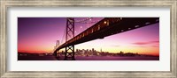 Framed Bay Bridge and city skyline at night, San Francisco, California, USA