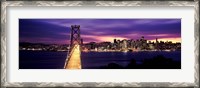 Framed Bridge lit up at dusk, Bay Bridge, San Francisco Bay, San Francisco, California