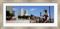 Framed Jester statue with buildings in the background, Riverwalk Area, New Orleans, Louisiana, USA