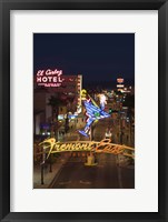 Framed Neon casino signs lit up at dusk, El Cortez, Fremont Street, The Strip, Las Vegas, Nevada, USA