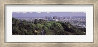 Framed Griffith Park Observatory and Los Angeles in the background, California