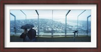 Framed Couple viewing a city from the Space Needle, Queen Anne Hill, Seattle, Washington State, USA