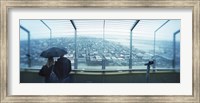 Framed Couple viewing a city from the Space Needle, Queen Anne Hill, Seattle, Washington State, USA