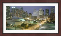 Framed Skyscrapers lit up at night, Houston, Texas