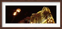 Framed Low angle view of a hotel lit up at night, The Strip, Las Vegas, Nevada, USA