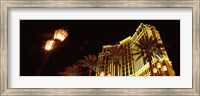 Framed Low angle view of a hotel lit up at night, The Strip, Las Vegas, Nevada, USA