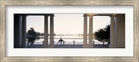 Framed Person stretching near colonnade, Lake Merritt, Oakland, Alameda County, California, USA