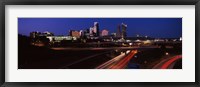 Framed Highway interchange and skyline at dusk, Kansas City, Missouri, USA