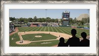 Framed Spectator watching a baseball match at stadium, Raley Field, West Sacramento, Yolo County, California, USA