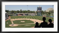 Framed Spectator watching a baseball match at stadium, Raley Field, West Sacramento, Yolo County, California, USA