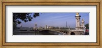 Framed Bridge across a river with the Eiffel Tower in the background, Pont Alexandre III, Seine River, Paris, Ile-de-France, France