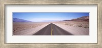 Framed USA, California, Death Valley, Empty highway in the valley