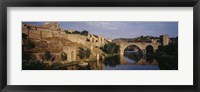 Framed Castle at the waterfront, Puente de San Martin, Tajo River, Toledo, Spain