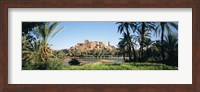Framed Palm trees with a fortress in the background, Tiffoultoute, Ouarzazate, Marrakesh, Morocco