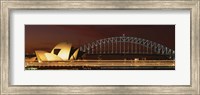 Framed Opera house lit up at night with light streaks, Sydney Harbor Bridge, Sydney Opera House, Sydney, New South Wales, Australia