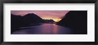 Framed Sunset over a lake, Sylvenstein Lake, Bavarian Alps, Germany