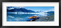 Framed USA, Alaska, Kayaks by the side of a river