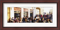 Framed Tourists sitting outside of a cafe, Barcelona, Spain