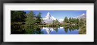 Framed Reflection of trees and mountain in a lake, Matterhorn, Switzerland