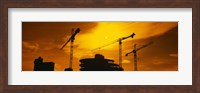 Framed Silhouette of cranes at a construction site, London, England