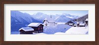 Framed Snow Covered Chapel and Chalets Swiss Alps Switzerland