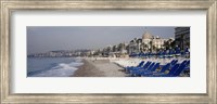 Framed Empty lounge chairs on the beach, Nice, French Riviera, France