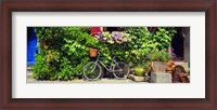Framed Bicycle In Front Of Wall Covered With Plants And Flowers, Rochefort En Terre, France