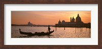 Framed Silhouette of a gondola in a canal at sunset, Santa Maria Della Salute, Venice, Italy