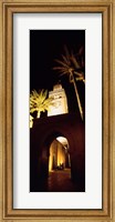 Framed Low angle view of a mosque lit up at night, Koutoubia Mosque, Marrakesh, Morocco