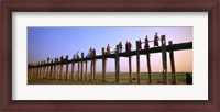 Framed Myanmar, Mandalay, U Bein Bridge, People crossing over the bridge