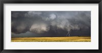 Framed Thunderstorm advancing over a field