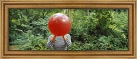 Framed Woman blowing a balloon, Germany