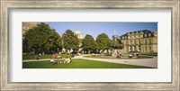 Framed Group Of People Sitting Around A Fountain In A Park, Schlossplatz, Stuttgart, Baden-Wurttemberg, Germany