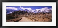 Framed Dirt road passing through an arid landscape, Lone Pine, Californian Sierra Nevada, California, USA