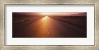 Framed Road passing through a desert, Nevada, USA