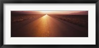 Framed Road passing through a desert, Nevada, USA