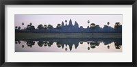 Framed Reflection of temples and palm trees in a lake, Angkor Wat, Cambodia