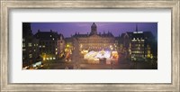 Framed High angle view of a town square lit up at dusk, Dam Square, Amsterdam, Netherlands