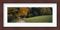 Framed Group of people walking on a walkway in a park, St. Peter, Black Forest, Baden-Wurttemberg, Germany