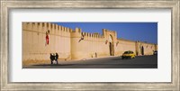 Framed Car on a road in front of a fortified wall, Medina, Kairwan, Tunisia