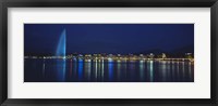 Framed Buildings lit up at night, Jet D'eau, Lake Geneva, Lausanne, Switzerland