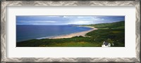 Framed Birds-eye view of sea, white stone cottage, Northern Ireland.
