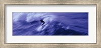 Framed High angle view of a person surfing in the sea, USA