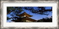 Framed Low angle view of trees in front of a temple, Kinkaku-ji Temple, Kyoto City, Kyoto Prefecture, Kinki Region, Honshu, Japan
