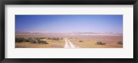 Framed Dirt road passing through a landscape, Carrizo Plain, San Luis Obispo County, California, USA