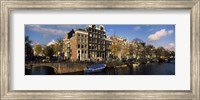 Framed Boats and Buildings along a canal, Amsterdam, Netherlands